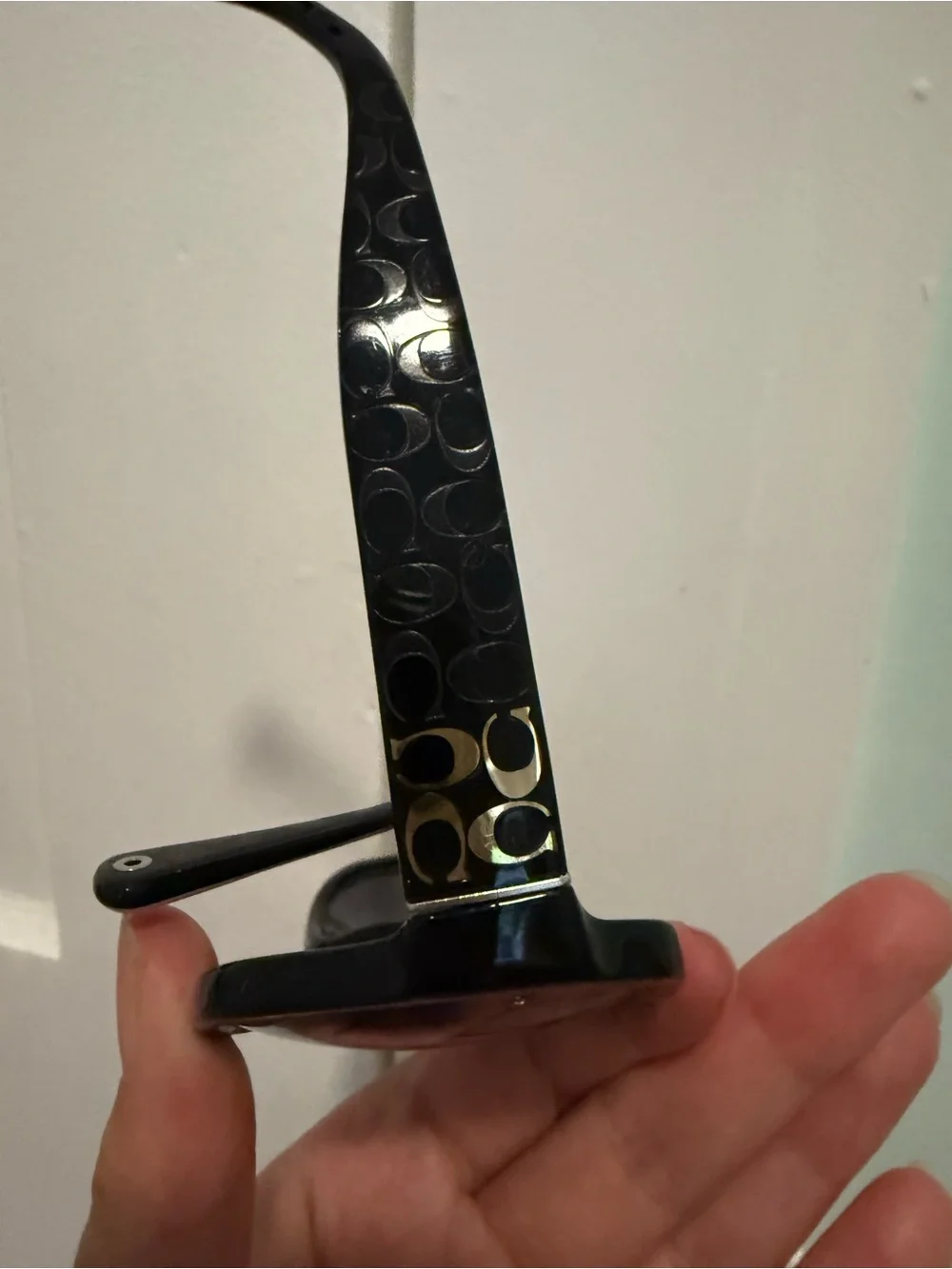 Coach “Emma” Black Logo-Accent Sunglasses with Gold and Pink Details